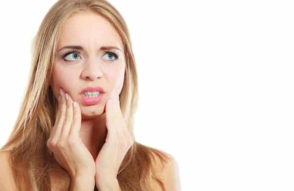Girl-With-Jaw-Pain-white Girl-With-Jaw-Pain-white